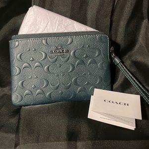 New, never used, Coach Wristlet.